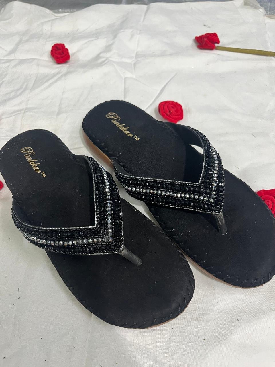 Black slip-on sandals